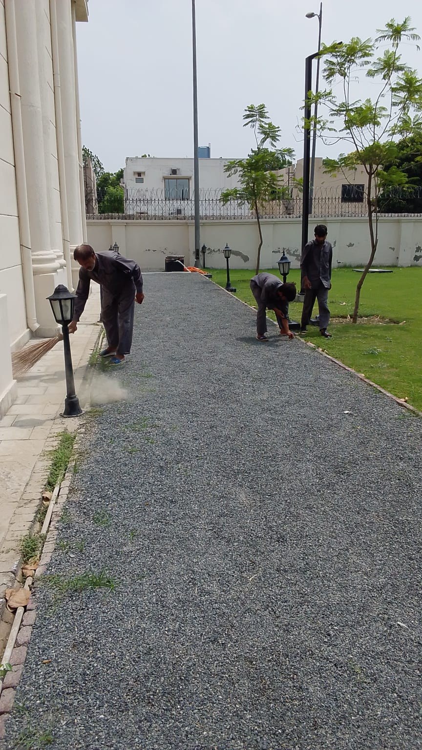 EHAS team carrying out exterior site maintenance